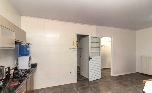 Casa no bairro Jardim Carvalho de 2 dormitórios e amplo pátio