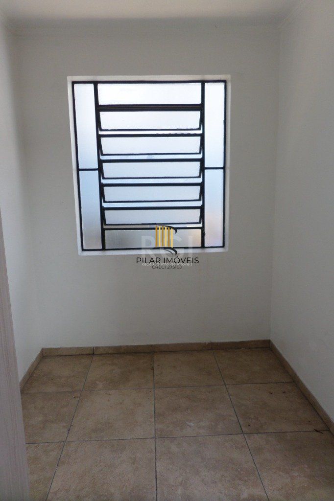 Casa no bairro Jardim Botânico de 3 dormitórios e 2 vagas