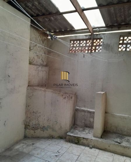 Apartamento no Centro térreo de 2 dormitórios com pátio