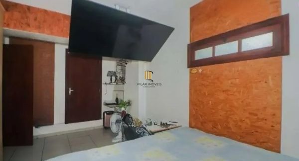Casa sobrado no bairro Vila Ipiranga de 4 dormitórios e 2 vagas