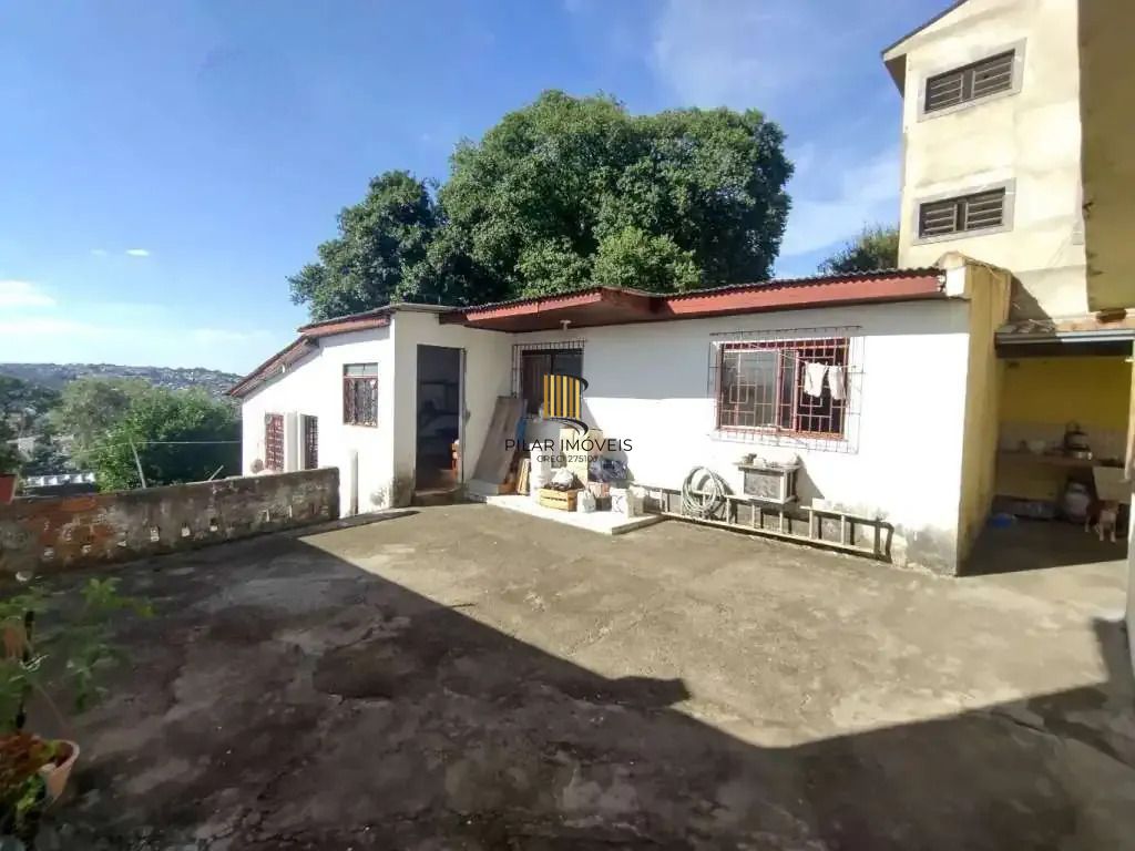 Casa 5 dormitórios no bairro Partenon