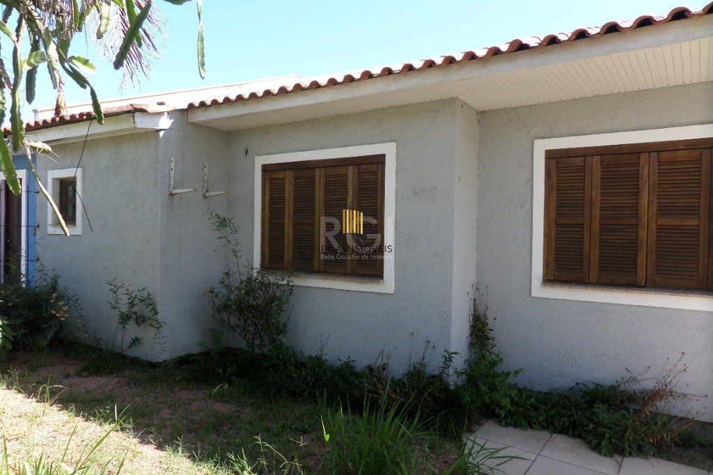 Casa na Hípica com 3 dormitórios e 2 vagas