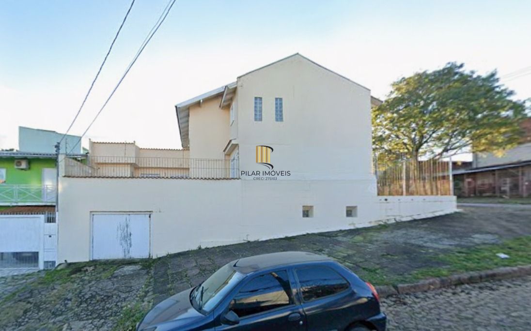 Casa sobrado no bairro Santo Antônio de 4 dormitórios e 2 vagas