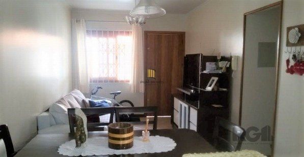 Casa em condomínio no Partenon de 3 dormitórios e vaga