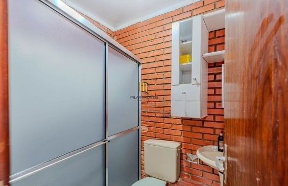 Casa em condomínio no bairro Santo Antômnio de 4 dormitórios e 2 vagas