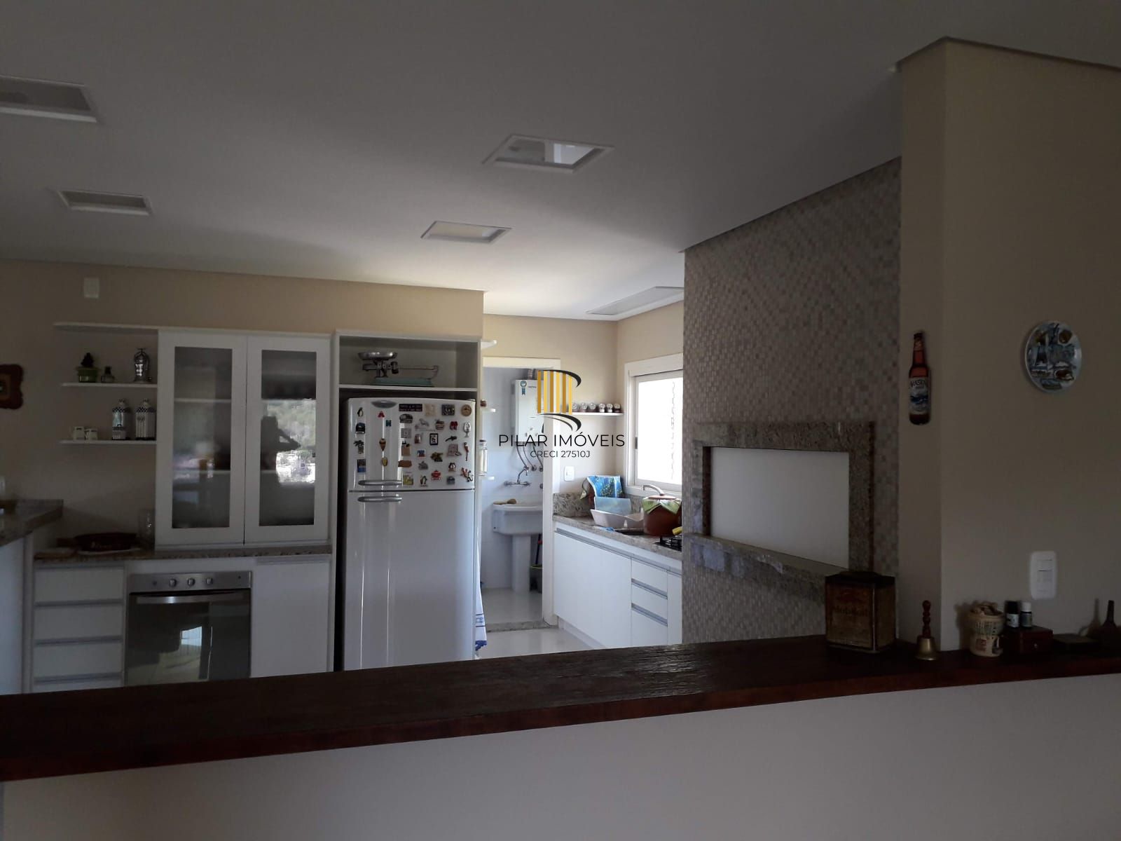 CASA COM 3 DORMIT