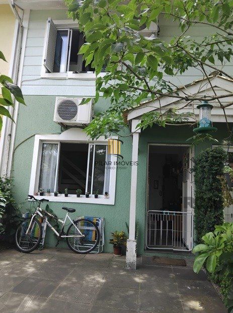 Casa em condomínio no Sarandi de 2d vaga e infra