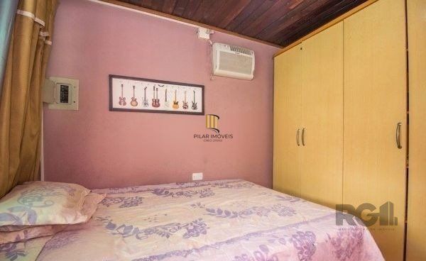 Casa sobrado no bairro Rio Branco de 4 dormitórios e vaga