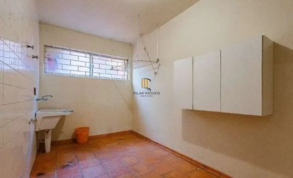 Casa sobrado no bairro Bela Vista de 3 dormitórios e 3 vagas DESOCUPADA