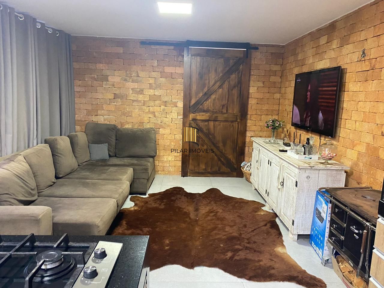 Casa sobrado no Condomínio Golden River em Imbé com 4 dormitórios