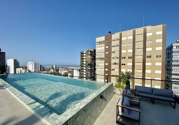 Apartamento em Torres Alto padrão de 3 dormitórios e 2 vagas