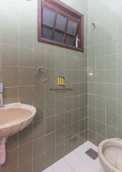 Casa no bairro Jardim Botânico de 4 dormitórios e 3 vagas