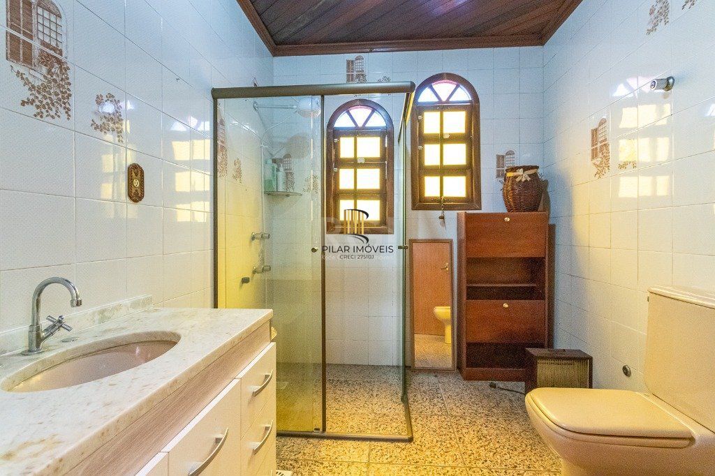 Casa sobrado no Jardim Botânico de 5 dormitórios e 2 vagas