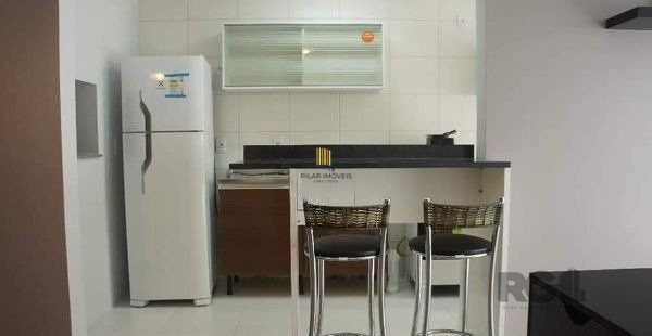 Apartamento no Urbano Menino Deus de 1 dormitório vaga e pátio