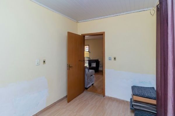 Casa / Terreno com 3 casas de alvenaria no bairro Morro Santana