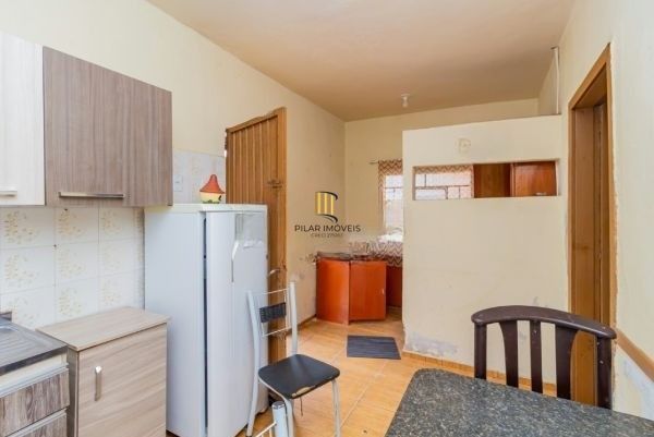 Casa / Terreno com 3 casas de alvenaria no bairro Morro Santana