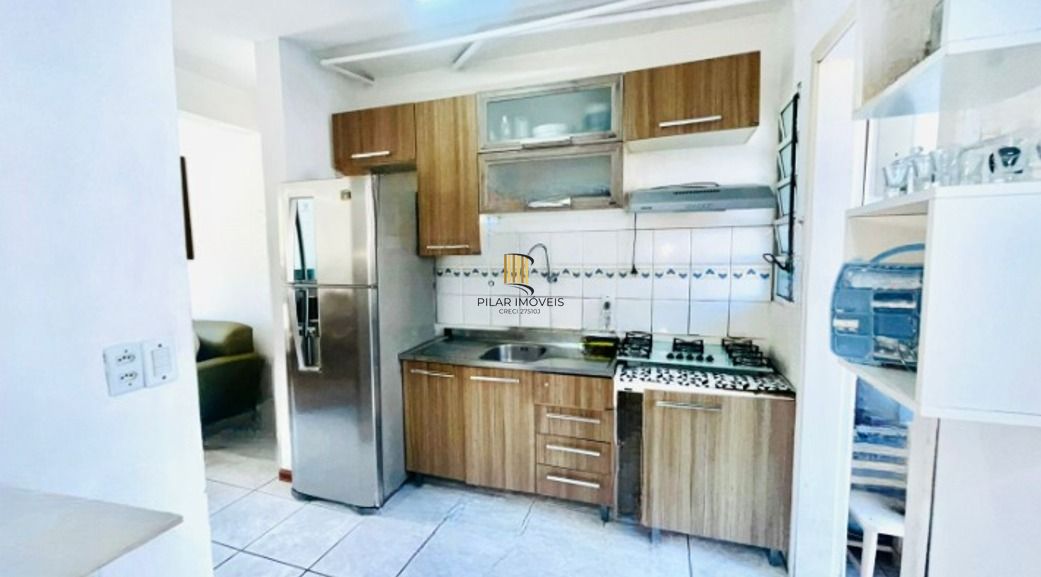 Casa em condomínio no bairro Sarandi de 2 dormitórios, vaga e infra