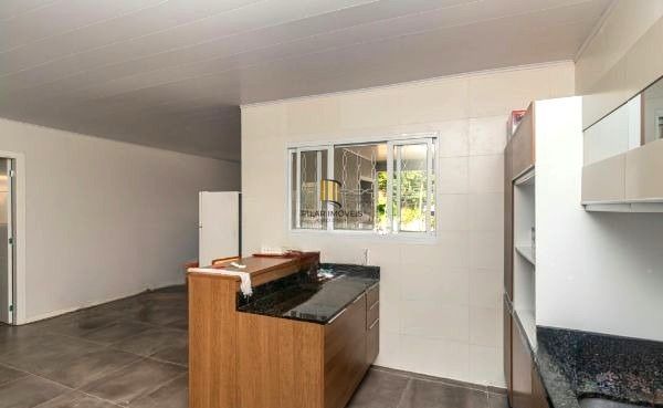 Casa no bairro Jardim Carvalho de 2 dormitórios e amplo pátio