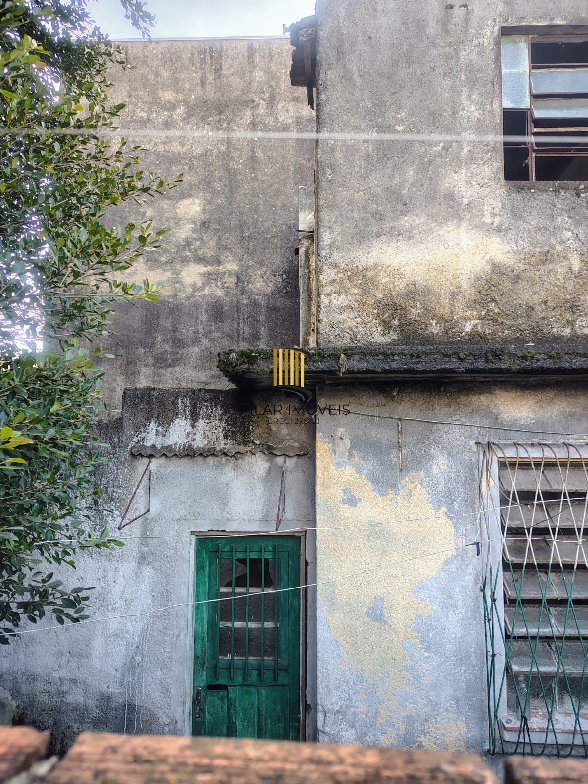 Casa e terreno no Partenon