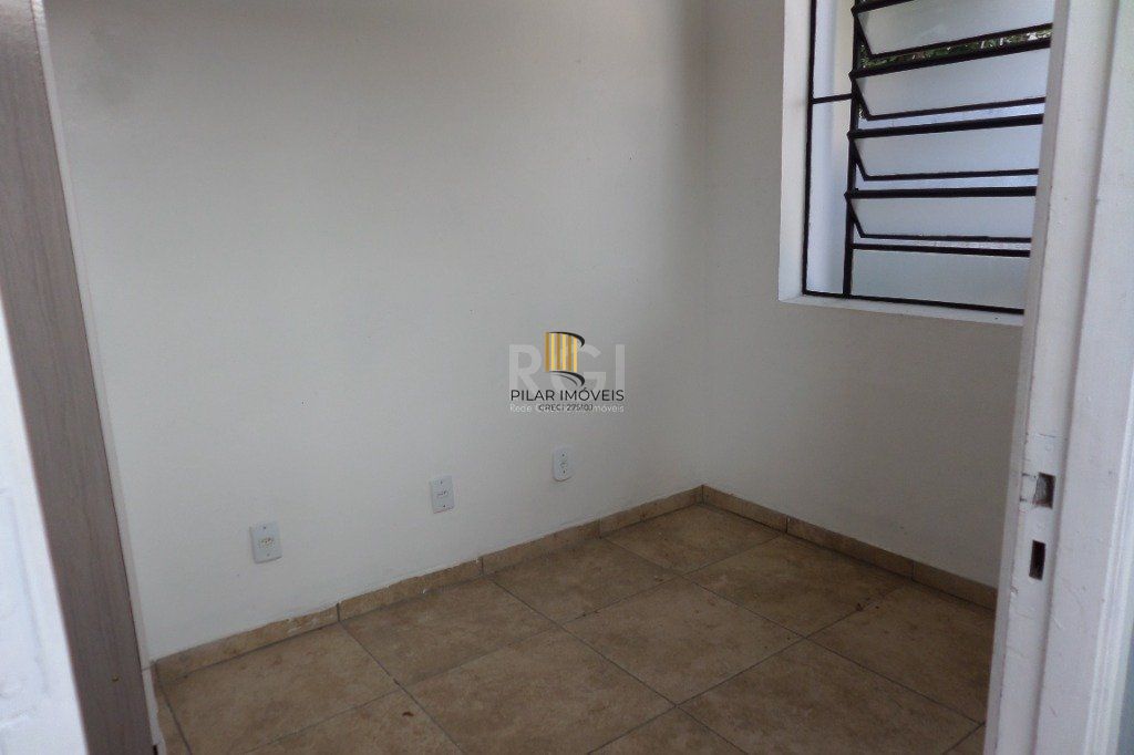 Casa no bairro Jardim Botânico de 3 dormitórios e 2 vagas