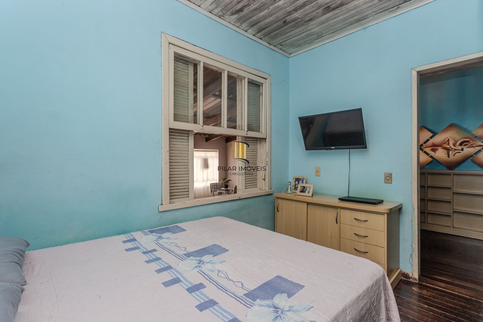 Casa no bairro Jardim Botânico de 3 dormitórios e garagem e terreno com 370m²