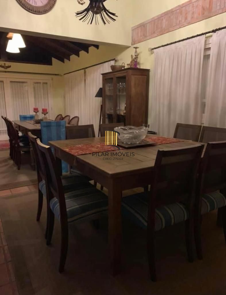 Casa na praia de Atlântida de 4 dormitórios