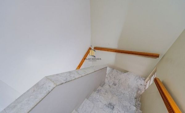 Casa em condomínio no bairro Santo Antômnio de 4 dormitórios e 2 vagas