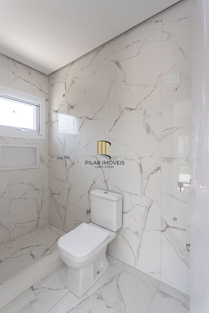 Casa de Condomínio 4 dormitórios no bairro Vila Nova