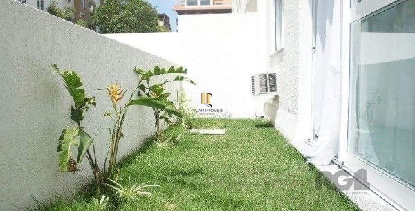 Apartamento no Urbano Menino Deus de 1 dormitório vaga e pátio