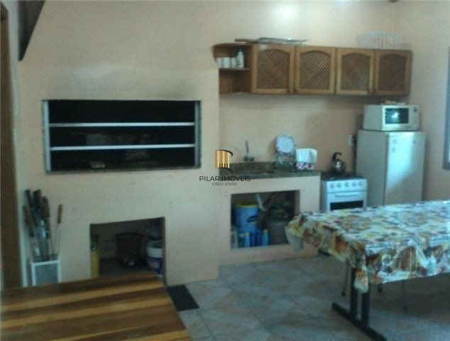 Casa em condomínio no Partenon de 3 dormitórios e vaga