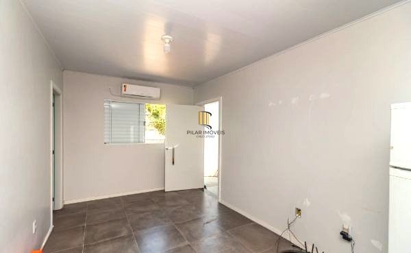 Casa no bairro Jardim Carvalho de 2 dormitórios e amplo pátio