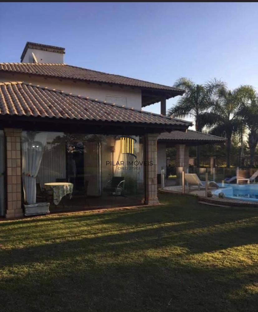 Casa na praia de Atlântida de 4 dormitórios