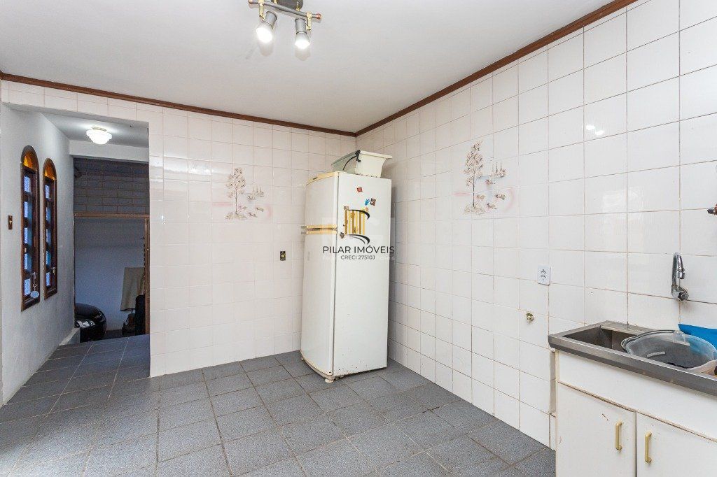 Casa sobrado no Jardim Botânico de 5 dormitórios e 2 vagas