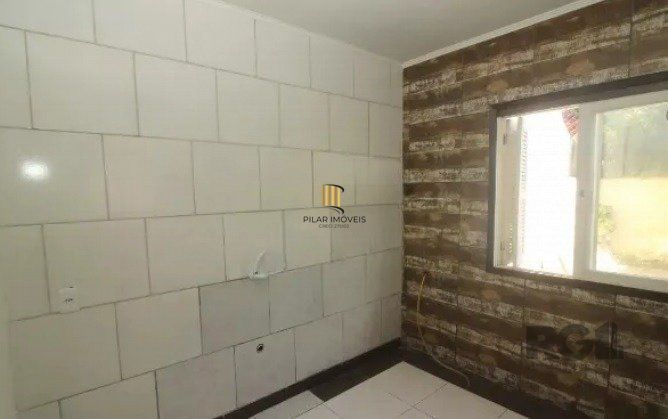 Casa em condomínio de 3 dormitórios e vaga no Partenon