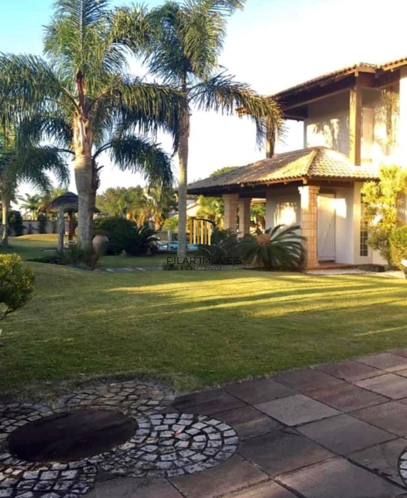 Casa na praia de Atlântida de 4 dormitórios