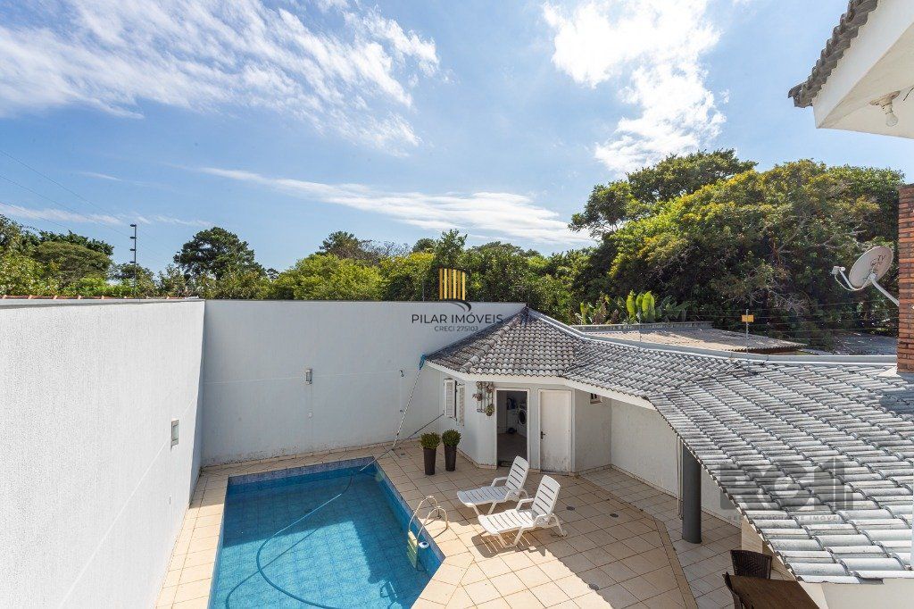 casa sobrado no Alto Petrópolis de 5 dormitórios e 3 vagas