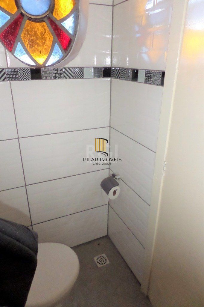 Casa no bairro Jardim Botânico de 3 dormitórios e 2 vagas