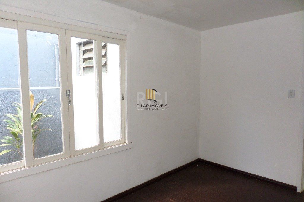 Casa no bairro Jardim Botânico de 3 dormitórios e 2 vagas
