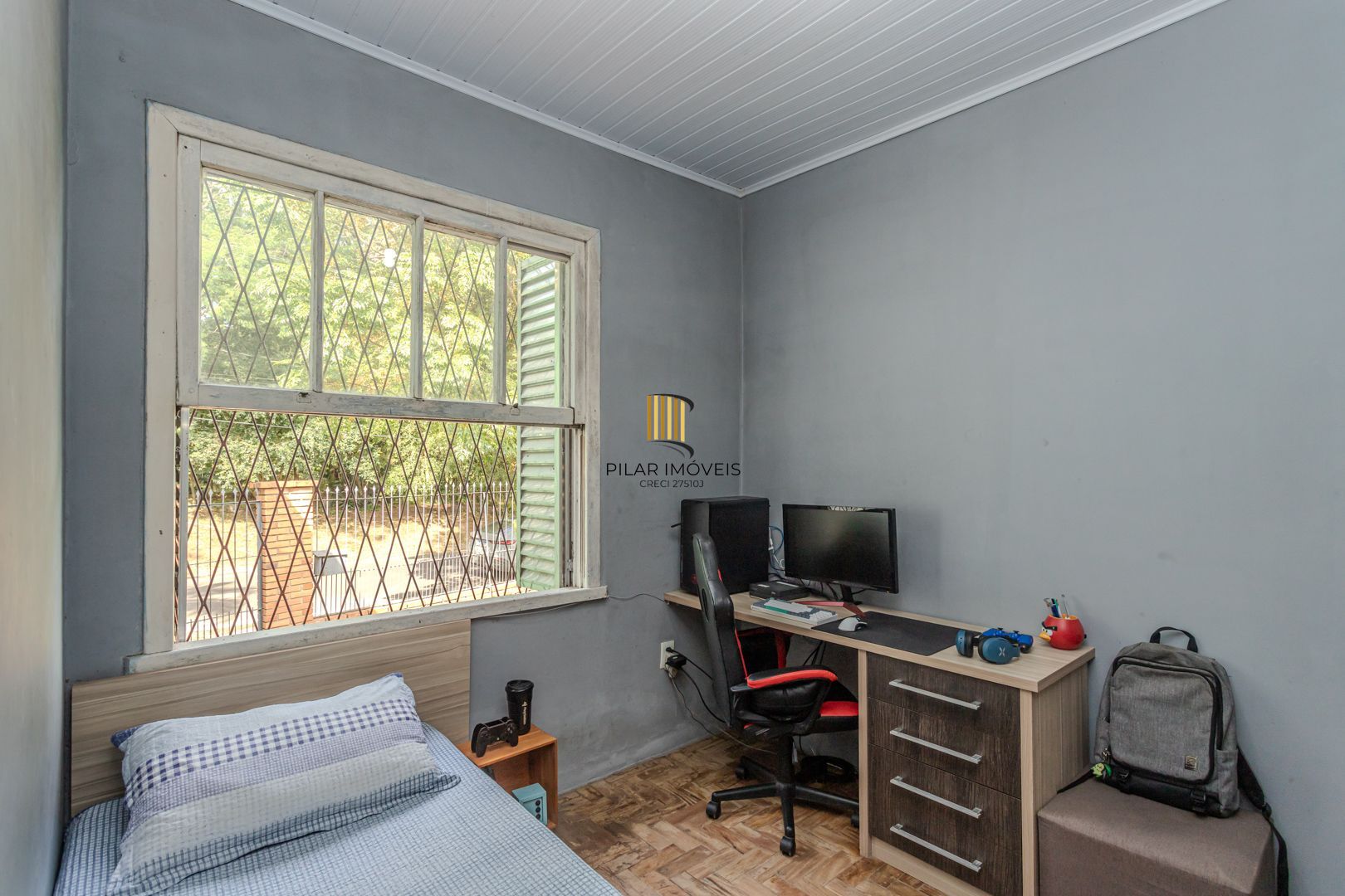 Casa no bairro Jardim Botânico de 3 dormitórios e garagem e terreno com 370m²