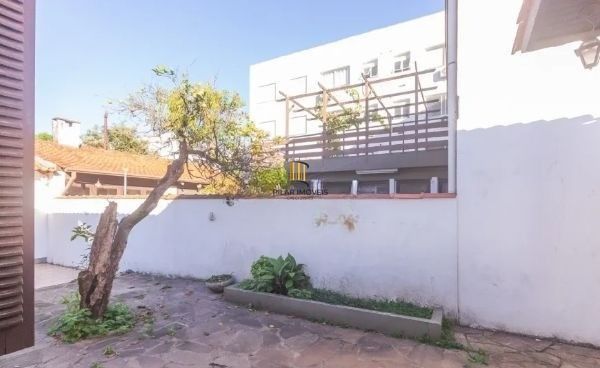 Casa no bairro Jardim Botânico de 4 dormitórios e 3 vagas