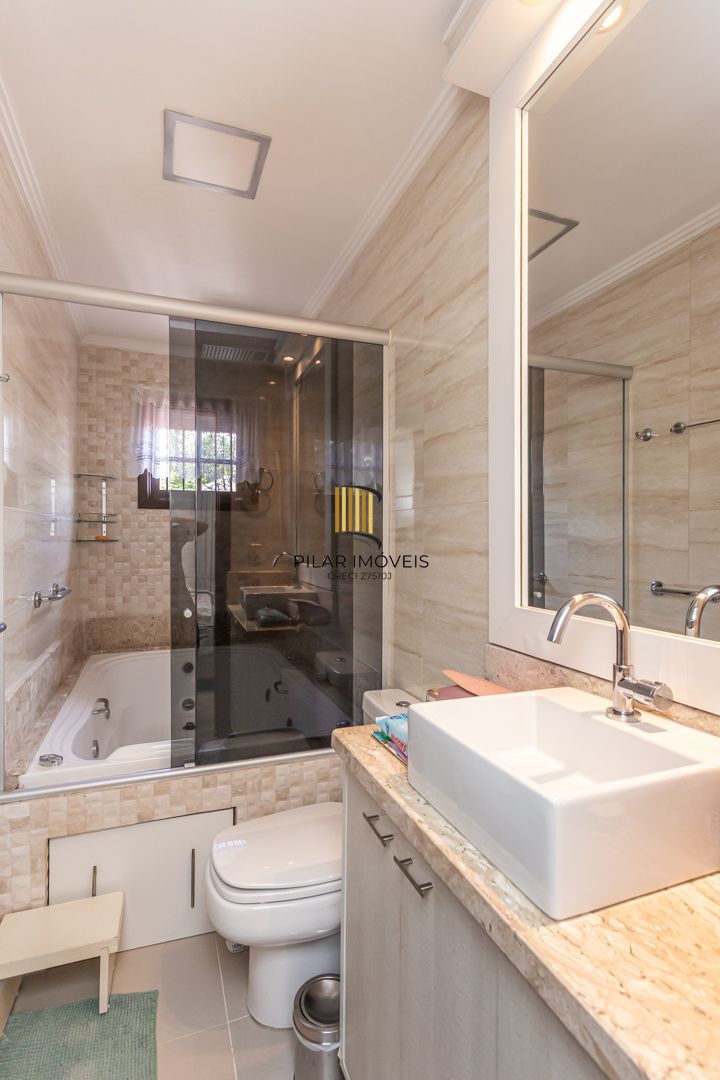 Casa 3 dormitórios no bairro Camaquã