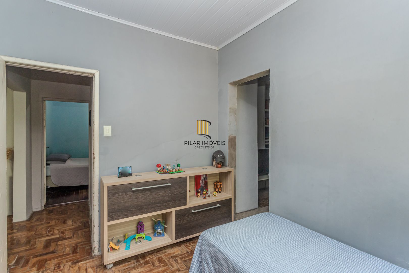 Casa no bairro Jardim Botânico de 3 dormitórios e garagem e terreno com 370m²