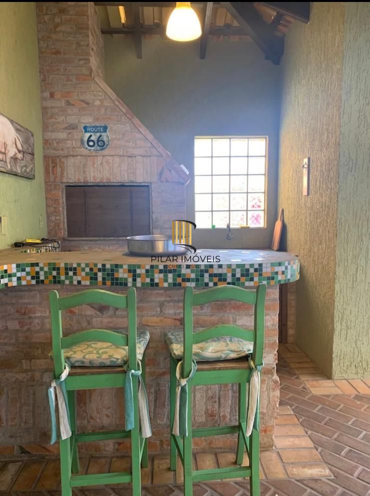 Casa na praia de Atlântida de 4 dormitórios