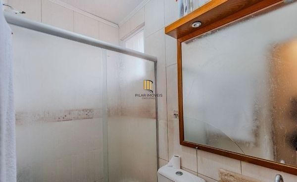 Casa em condomínio no bairro Santo Antômnio de 4 dormitórios e 2 vagas