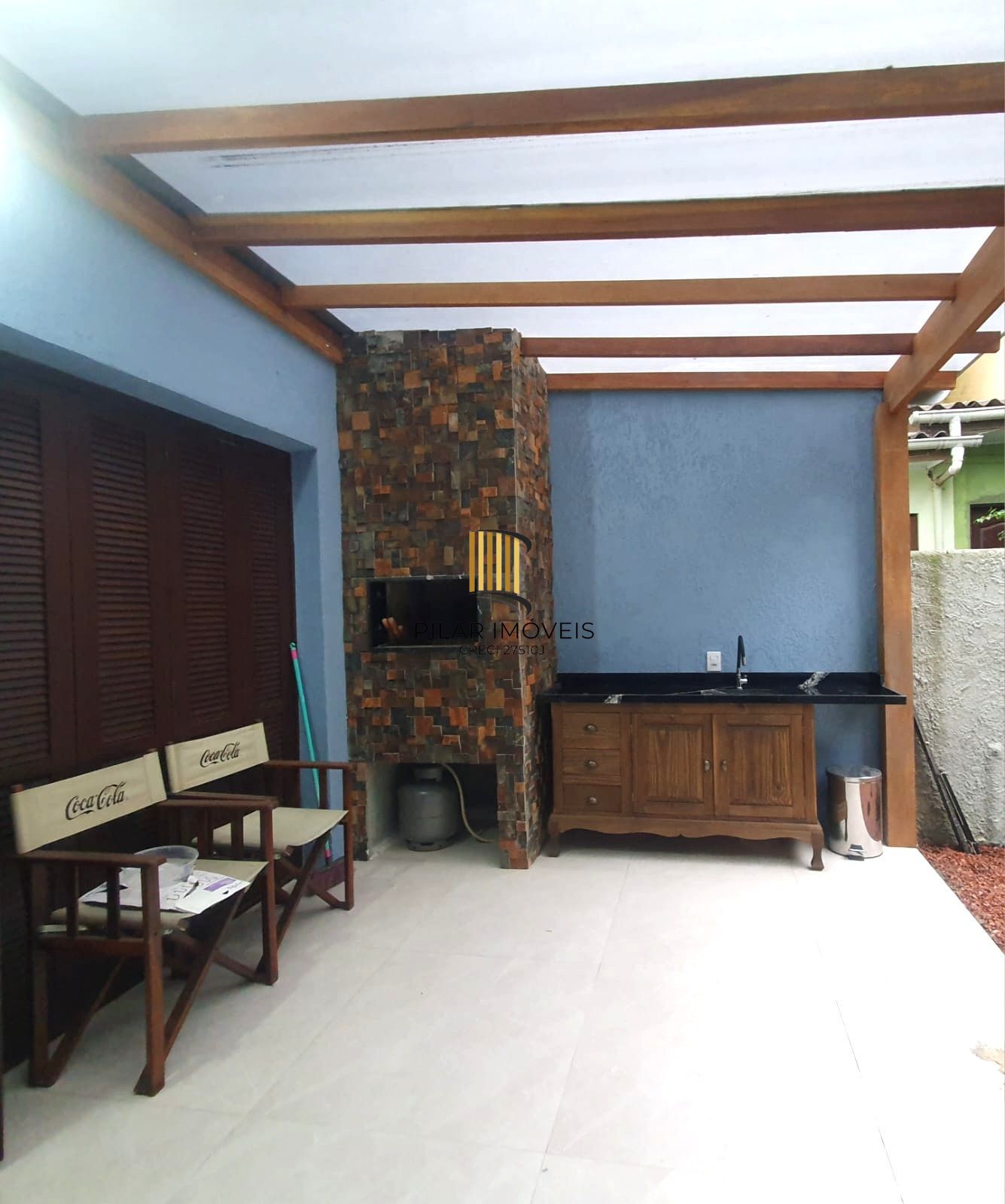 Sobrado no Menino Deus de 3 dormitórios e vaga