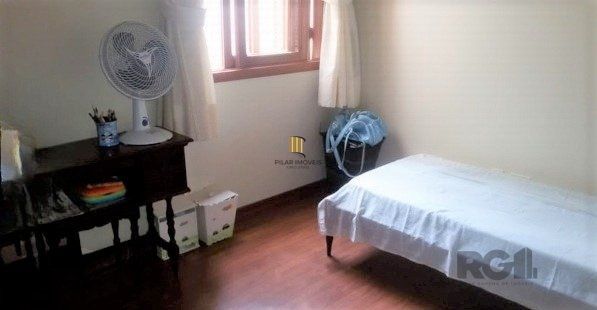 Casa em condomínio no Partenon de 3 dormitórios e vaga