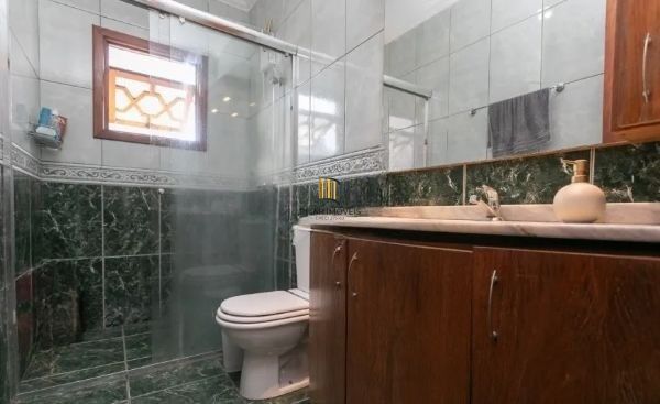 Casa sobrado no bairro Ecoville de 3 dormitórios e 4 vagas