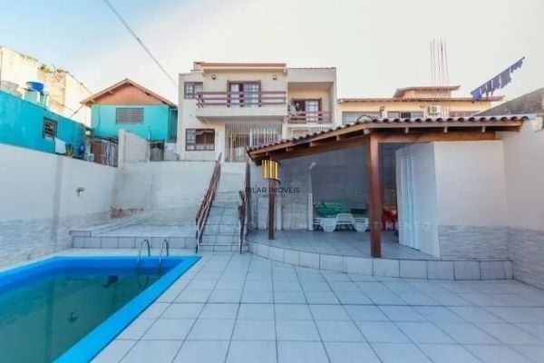Casa / sobrado no bairro Jardim Itu de 3 dormitórios e pátio com piscina