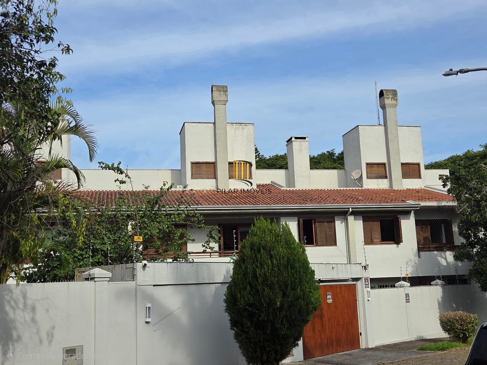 Casa de Condomínio 5 dormitórios no bairro Três Figueiras