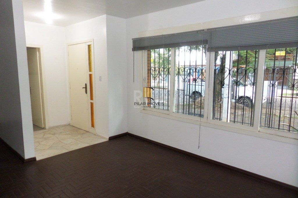 Casa no bairro Jardim Botânico de 3 dormitórios e 2 vagas